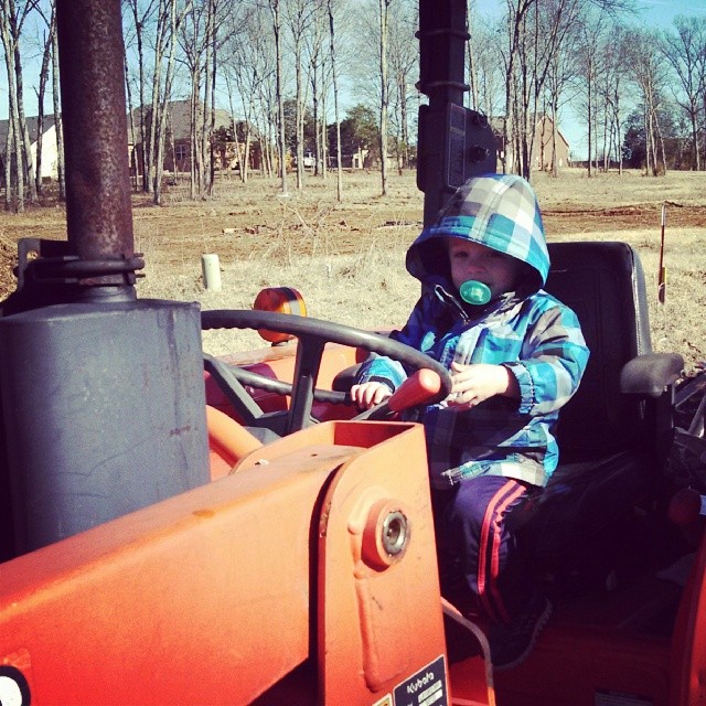 Why yes, I do normally operate my tractor with a pacifier
